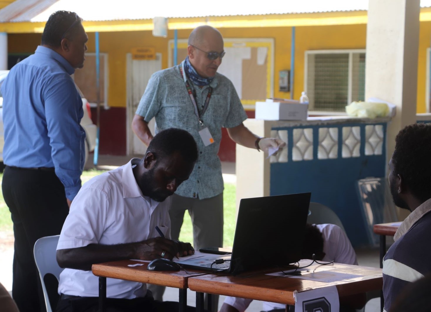 UNCDF Digital Finance Expert Sanjay explain the payment process to CBSI Governor Luke Forau 