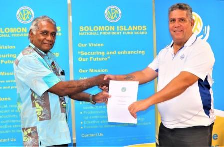 Caption: SINPF Board Chairman Dr Jimmie Rodgers and Solomon Airline Chairman Frank Wickham